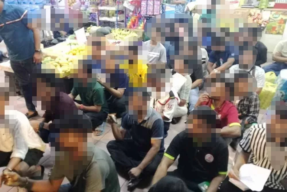 Antara warga asing yang ditahan dalam Ops Belanja sekitar Bukit Bintang pada Selasa.