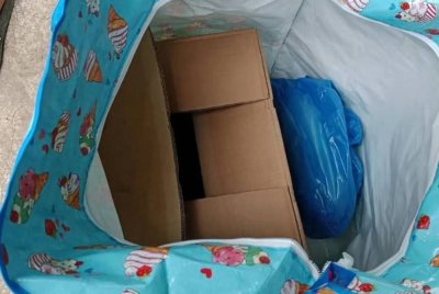 Jasad bayi itu hanya diletakkan di dalam kadbod ketika kematian pertama. Foto Agensi