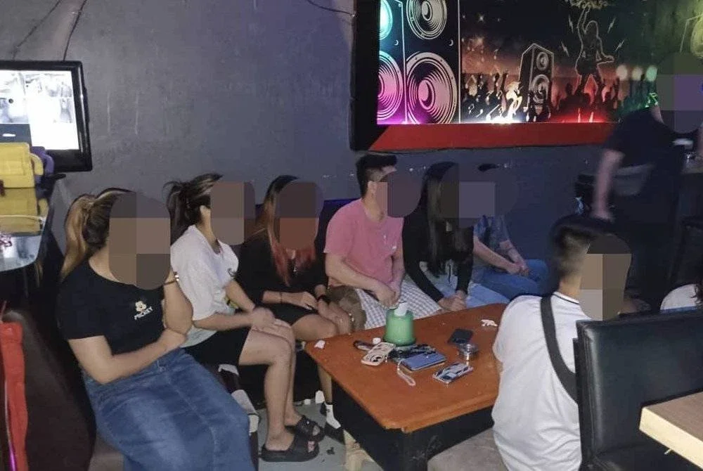 Antara warga Myanmar yang ditahan di sebuah pusat hiburan di Negeri Sembilan pada Sabtu.