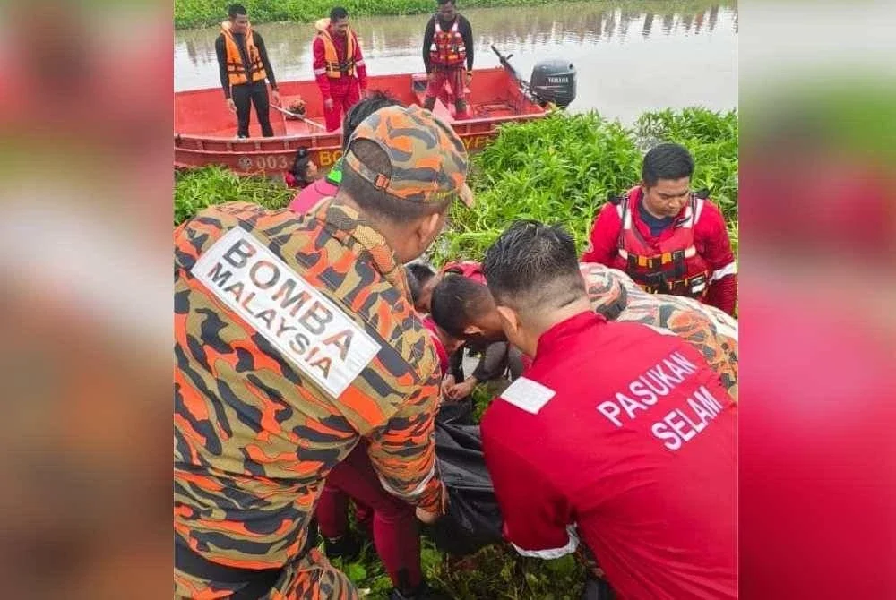 Anggota bomba dan pasukan selam menaikkan mayat mangsa yang ditemui di dasar sungai pada pagi Ahad.