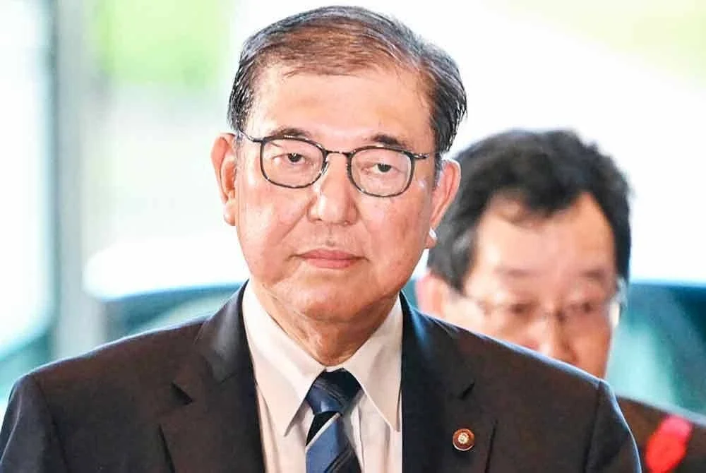 Penentang beliau menuntutnya agar berundur untuk bertanggungjawab terhadap keputusan pilihan raya selepas parti pemerintah kehilangan majoriti Dewan Kaunselor pada Julai lalu. - Foto Agensi