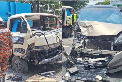 Keadaan lori dan kereta remuk selepas terbabit kemalangan di Lebuhraya Tun Dr Lim Chong Eu berhampiran Kampung Batu Uban pada Ahad.