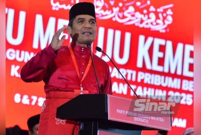 Mohd Radzi ketika menyampaikan ucapan pergulungan pada PAT Bersatu ke-8 di IDCC Shah Alam pada Ahad. Foto Sinar Harian ASRIL ASWANDI SHUKOR