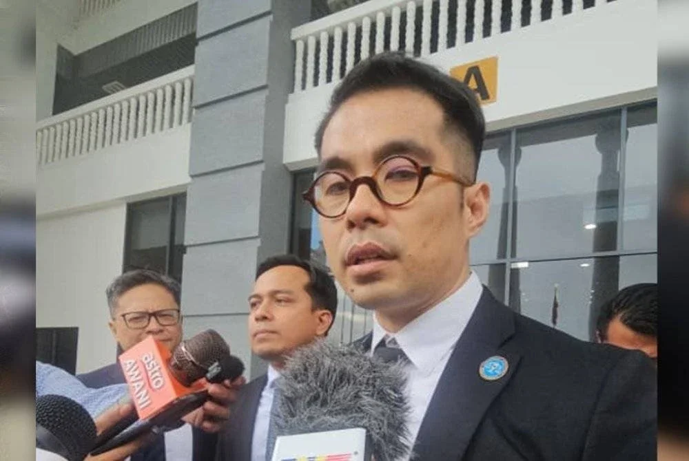 Syarulnizam ketika ditemui pemberita di pekarangan Mahkamah Kota Kinabalu.