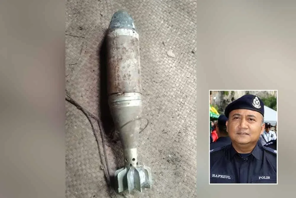 Bom mortar yang ditemui pengadu ketika sedang membersihkan rumah baru dibelinya di Kampung Padang Marhum, Teluk Bakong di Bota Kanan pada Selasa. Foto: Ihsan pembaca, gambar kecil: Hafezul Helmi