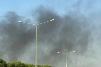 Asap tebal menyelebungi udara Doha, Qatar.-Agensi