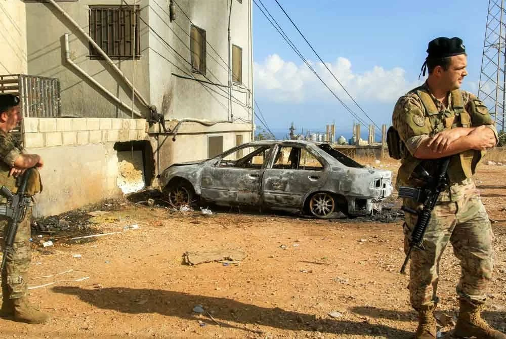 Anggota tentera dikerahkan untuk berkawal di lokasi serangan di selatan Beirut pada Selasa.