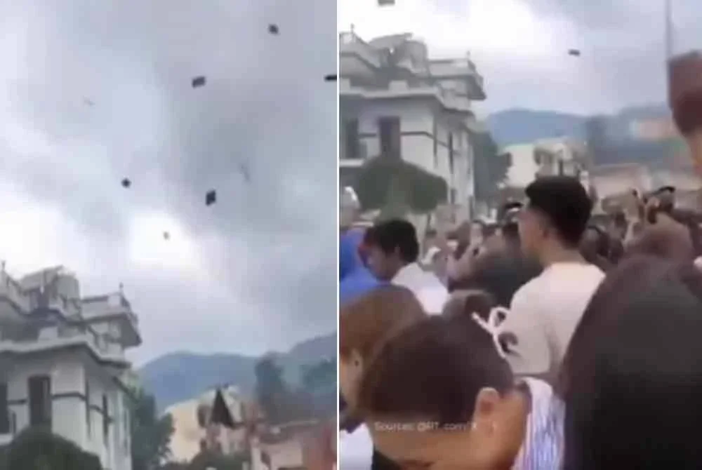 Wang kertas berterbangan. -Agensi