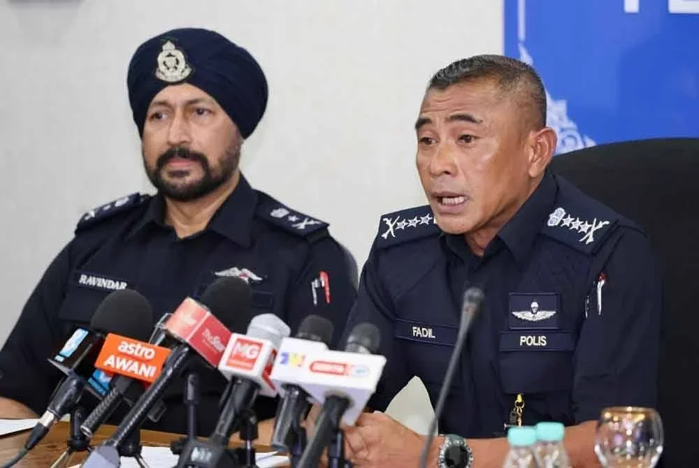 Fadil (kanan) berkata pihaknya telah membuka tiga kertas siasatan mengikut Seksyen 186, 353 dan 324 Kanun Keseksaan.