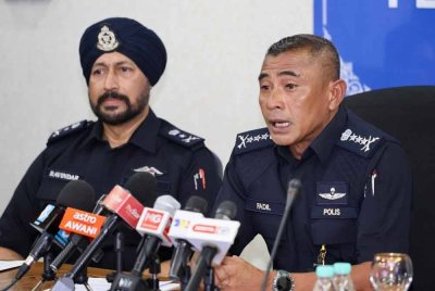 Fadil (kanan) berkata pihaknya telah membuka tiga kertas siasatan mengikut Seksyen 186, 353 dan 324 Kanun Keseksaan.