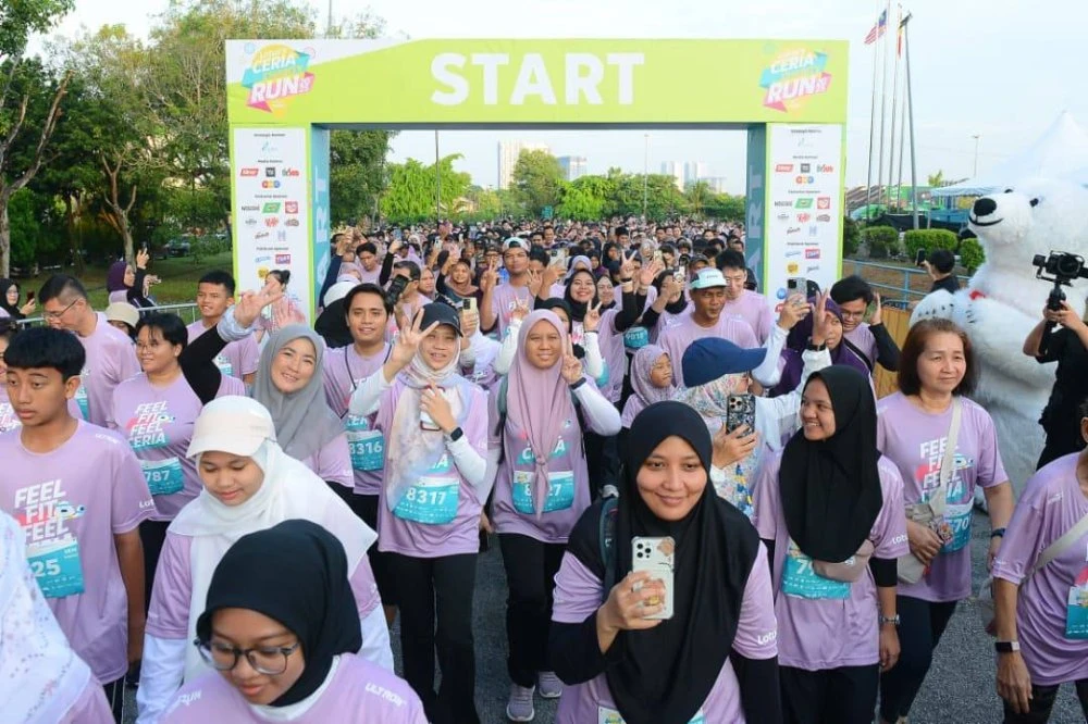Wajah kegembiraan peserta menyertai Larian Amal Tahunan Lotus's Ceria Charity Run 2025 di Lotus's Bandar Bukit Puchong pada Ahad.