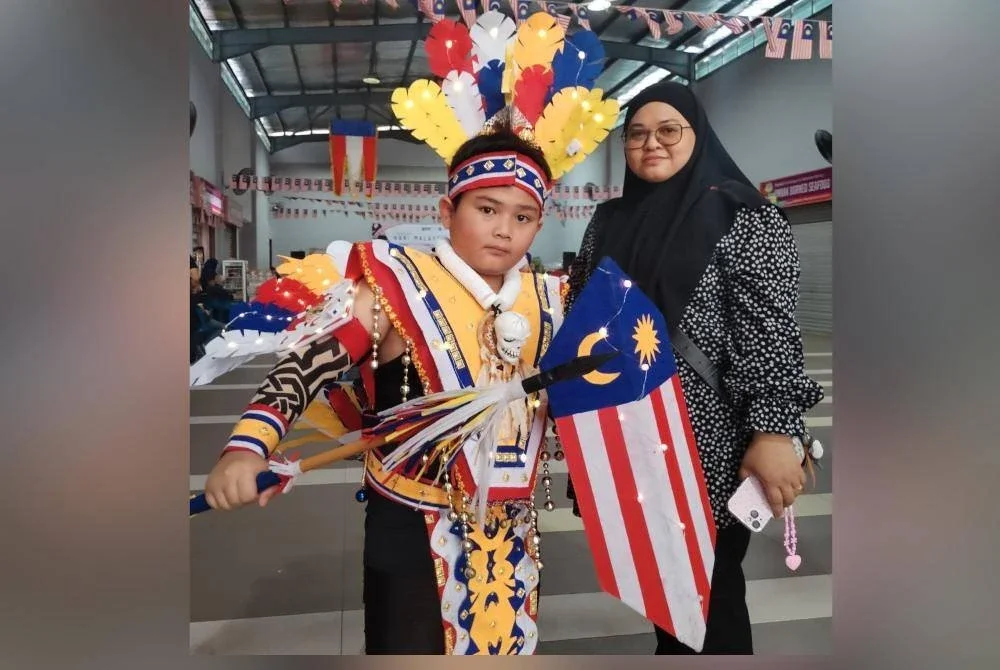 Sharifah Marina bersama Saif Islam.
