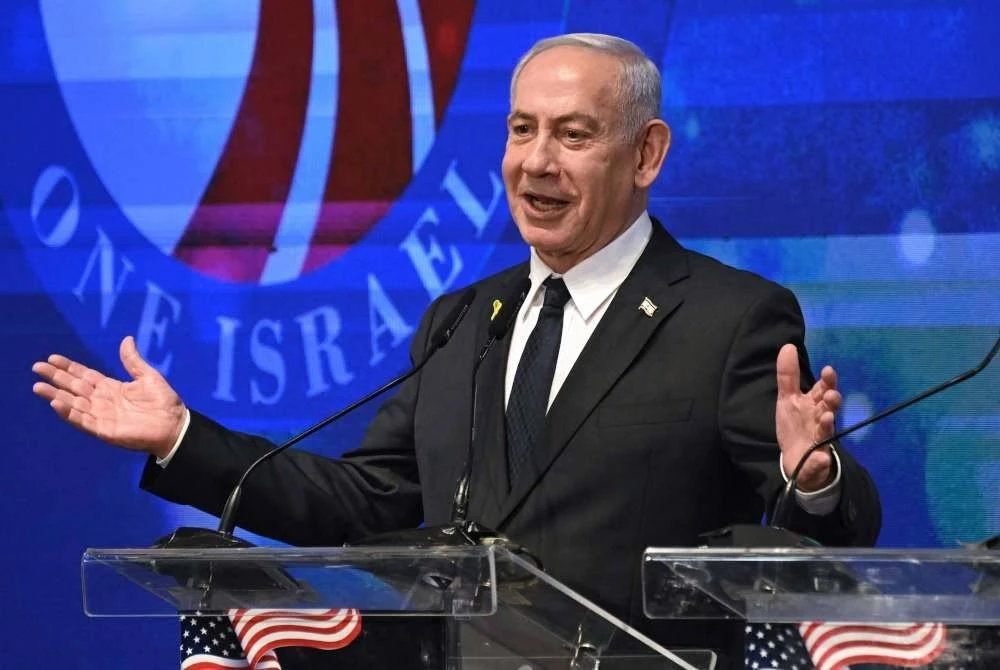 Netanyahu bercakap dengan ahli delegasi dwipartisan penggubal undang-undang Amerika Syarikat di Kementerian Luar di Baitulmaqdis pada Isnin. Foto AFP
