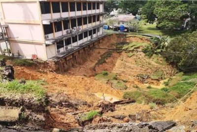 Insiden tanah runtuh telah menyebabkan kerosakan pada cerun dan beberapa blok bangunan. Foto media sosial