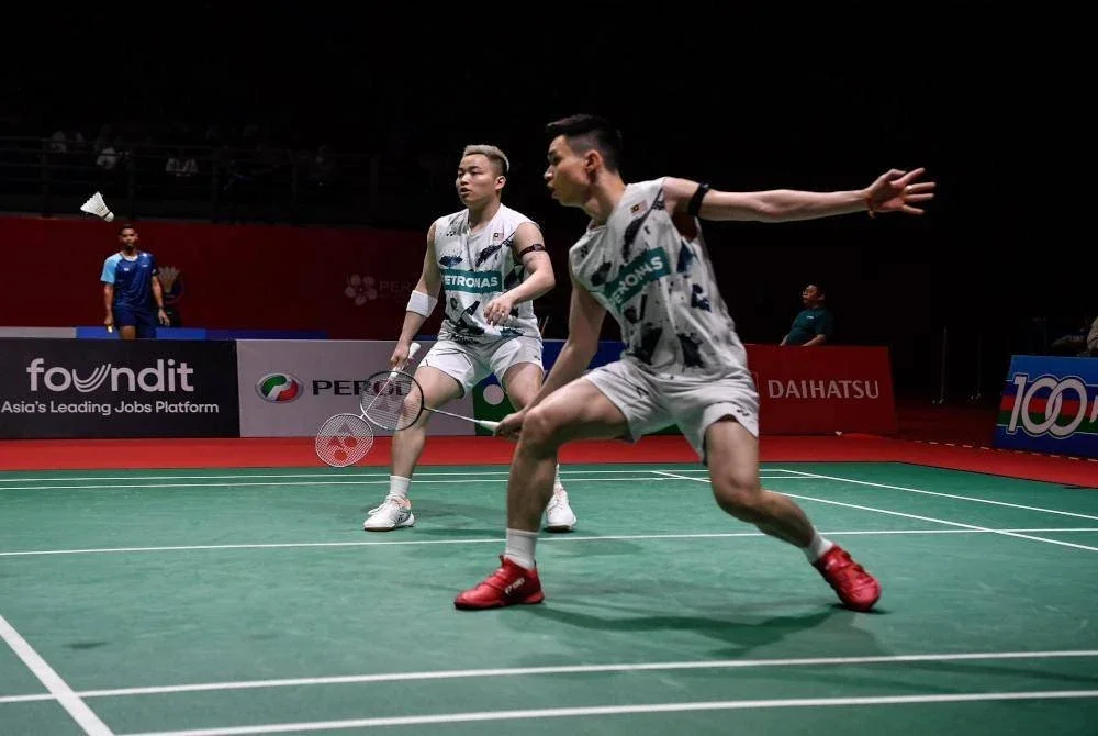 Aaron-Wooi Yik bangkit garang untuk mara ke suku akhir Masters China. Foto Agensi