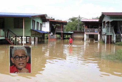 Kawasan perumahan perkampungan Kibabaig, daerah Penampang yang terjejas berikutan hujan lebat baru-baru ini. Foto: BERNAMA. Gambar kecil: Tengku Ahmad Badli Shah