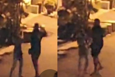 Video tular memaparkan seorang wanita dipukul teman lelakinya di sini pada Khamis