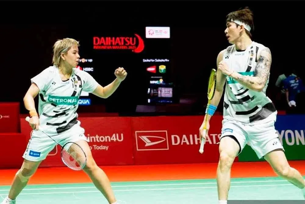 Ee Wei (kiri) dan Tang Jie. Foto Agensi