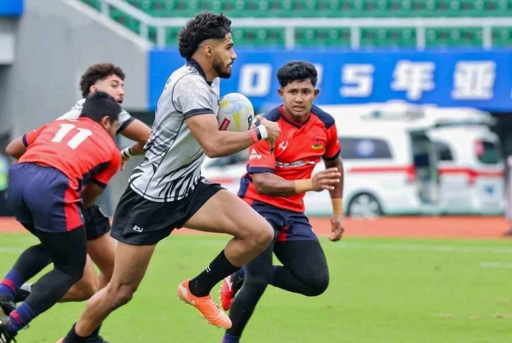 Sebahagian aksi Malaysia menentang UAE dalam penentuan kelima keenam di Hangzhou. Foto Kesatuan Ragbi Malaysia