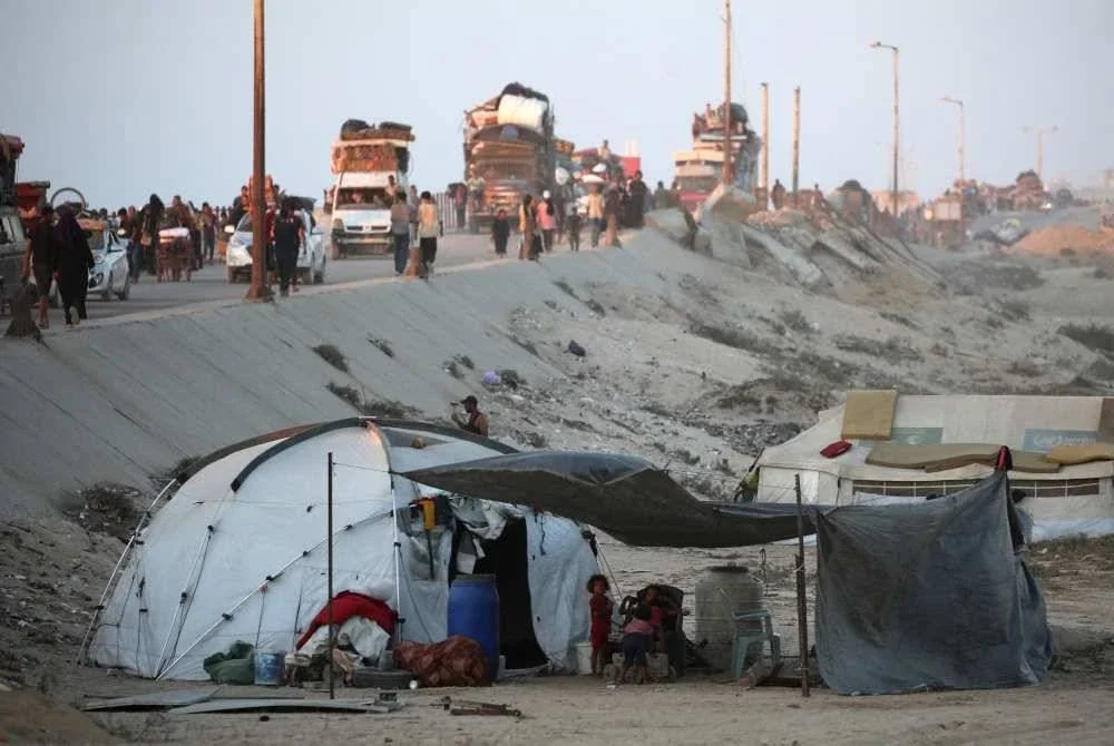 Terdapat keluarga yang tidak berkemampuan untuk berpindah ke selatan. Foto AFP