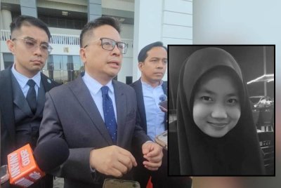 Rizwandean (tengah) bersama pasukannya ketika ditemui pemberita di pekarangan Kompleks Mahkamah Kota Kinabalu pada Rabu.