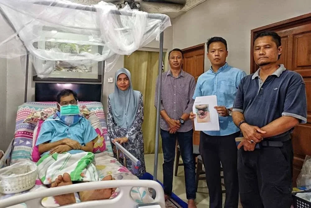Mohd Ridzuan memohon bantuan orang ramai bagi membantu membiayai rawatan kanser lidah yang dilalui.. Foto Sinar Harian.