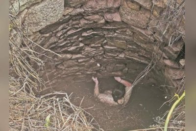 Qin terjatuh dan terperangkap dalam telaga hampir 54 jam sebelum diselamatkan. Foto Agensi