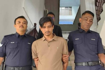 Md Rasal (tengah) mengaku bersalah di Mahkamah Majistret kerana mencederakan kekasihnya minggu lalu.