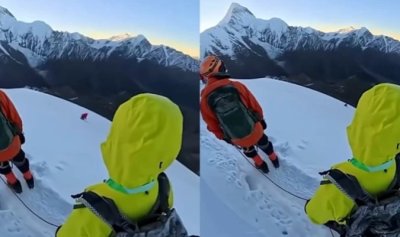 Rakaman tular menunjukkan detik pelancong China terjatuh dari Gunung Nama selepas dipercayai membuka tali keselamatan untuk merakam gambar. – Agensi