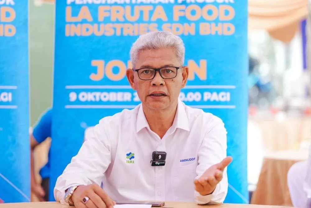 Aminuddin dalam sidang media Majlis Flag Off Pengeksportan Produk Syarikat La Fruta Food Industries Sdn Bhd ke Pasaran Jordan di Kota Kemuning, Shah Alam pada Khamis.