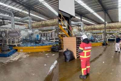 Kira-kira 11 pekerja cedera akibat kebocoran bahan kimia isosianat di sebuah kilang di Tanjung Malim. Foto Bomba Perak