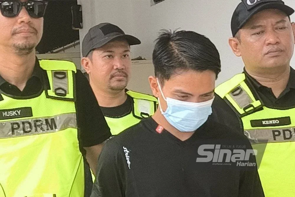 Pihak polis membawa Muhamad Zaid ke Mahkamah Majistret Selayang pada Jumaat bagi menghadapi satu pertuduhan menyebabkan kematian abang iparnya di sebuah kawasan hutan di sini, minggu lalu. Foto Sinar Harian