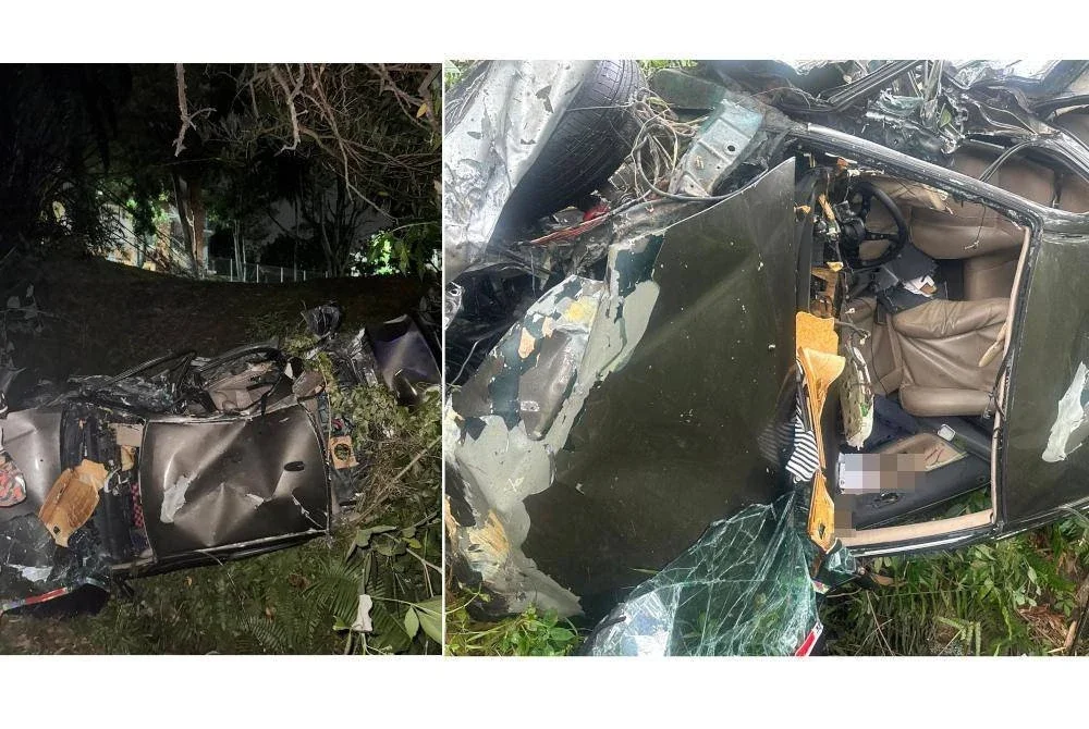 Keadaan kereta remuk selepas terjunam dalam gaung di Kilometer 301.2 Lebuhraya Kuala Lumpur–Seremban pada Jumaat.