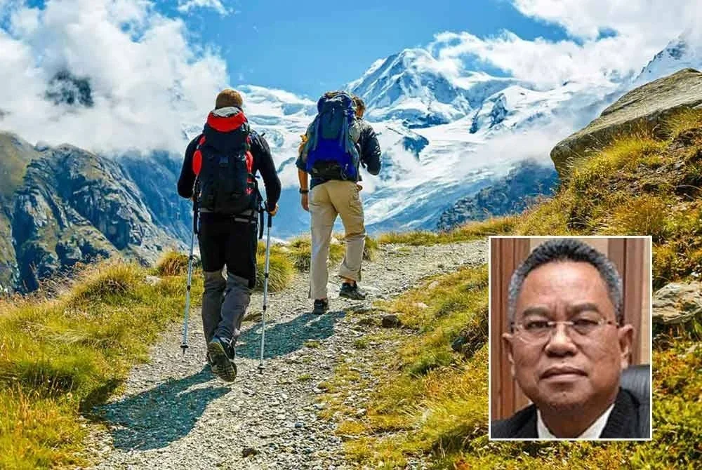 Pencegahan hipotermia termasuk memakai pakaian berlapis dan memilih bahan yang sesuai untuk kawasan sejuk. - Gambar hiasan, gambar kecil: Zainal