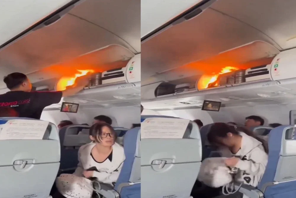 Tangkap layar video tular memaparkan keadaan ketika bateri litium penumpang terbakar dalam kabin.