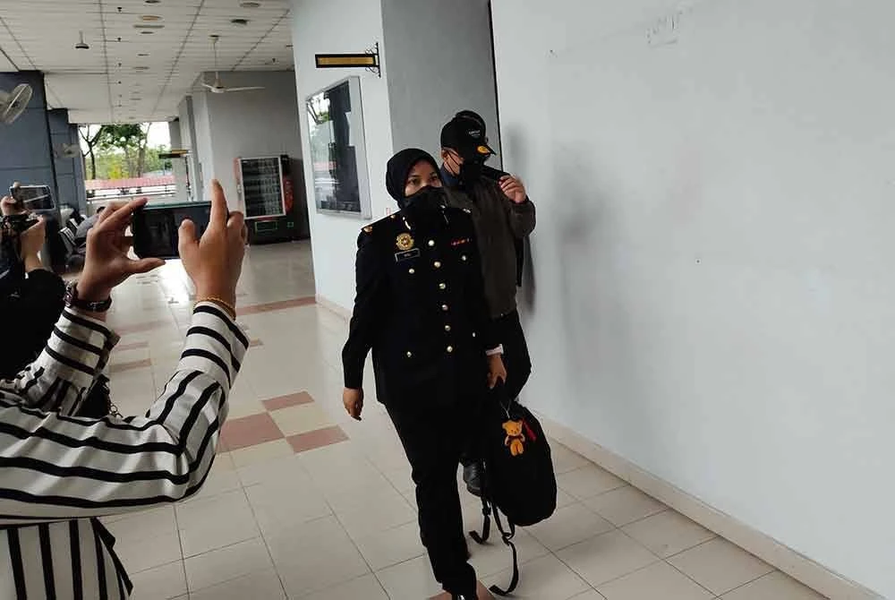 Tertuduh dibawa ke Mahkamah Sesyen Seremban pada Rabu atas dua pertuduhan.