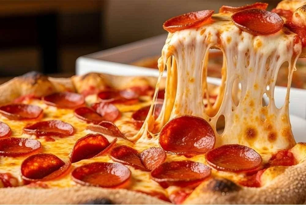 Seorang lelaki warga Jerman didakwa meracuni isterinya sebanyak tujuh kali termasuk melalui piza sejuk beku. Gambar hiasan