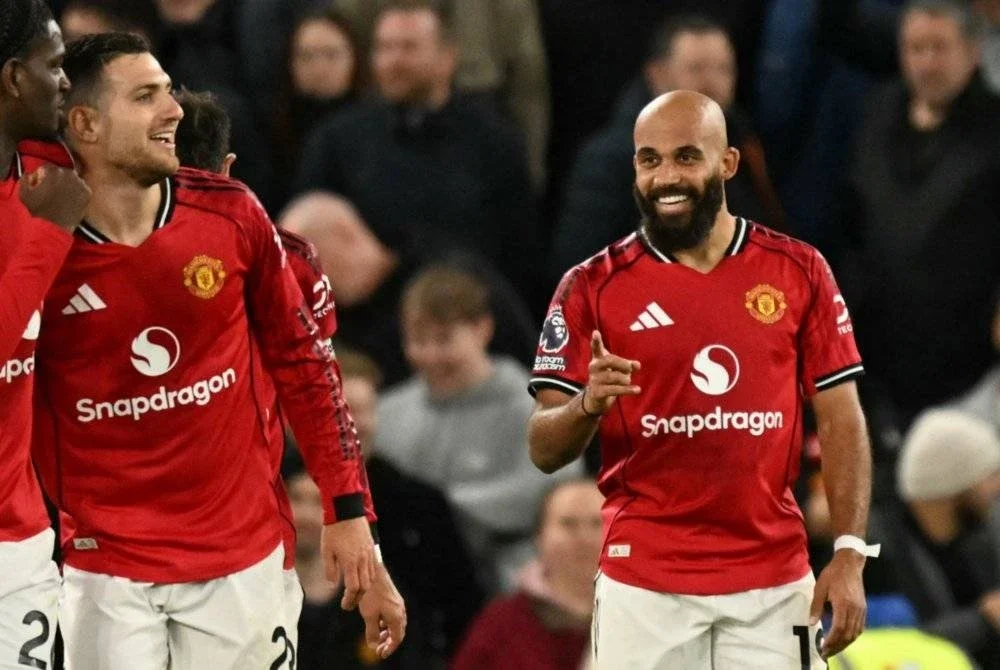 Reaksi Mbeumo (kanan) selepas meledak jaringan ketika menentang Brighton. Foto AFP