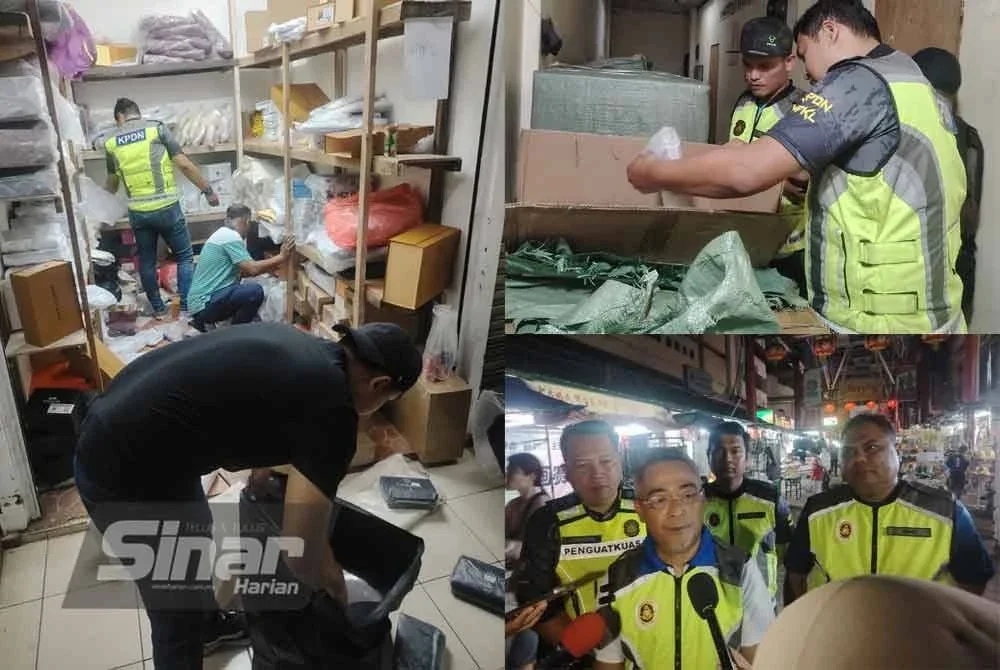 KPDN Kuala Lumpur menjalankan pemeriksaan di premis stor yang diserbu di Jalan Petaling, Kuala Lumpur pada Khamis.