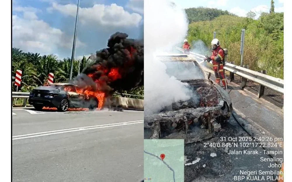 Anggota bomba memadam kebakaran melibatkan sebuah kenderaan jenis Toyota Lexus di Jalan Selaru, Kuala Pilah - Tampin, di sini.