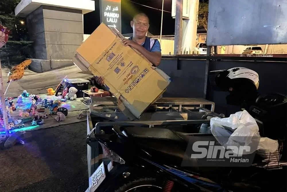 Motosikal yang dipinjam dari adinya untuk berniaga dan mencari kotak. FOTO SINAR HARIAN - ADILA SHARINNI WAHID