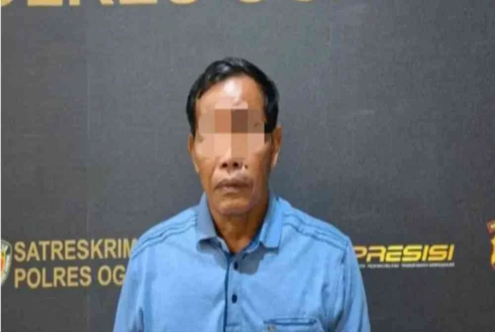 Seorang lelaki di Ogan Ilir, Sumatera Selatan, ditahan pihak polis selepas menyerang isterinya dipercayai akibat rasa cemburu. Foto: Agensi