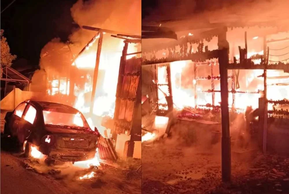 Tiga beranak hanya mampu melihat kereta dan rumah sewa yang didiami mereka hangus depan mata dalam kejadian di Kampung Wakaf Mek Zainab, Kota Bharu pada pagi Rabu. - Foto: JBPM