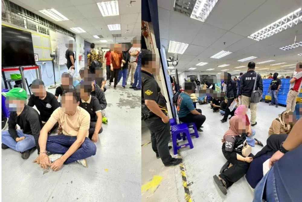 JPN menggempur sebuah kilang di Pelabuhan Klang pada Selasa dan menahan 32 warga asing disyaki menggunakan MyKad palsu dan milik orang lain. Foto JPN