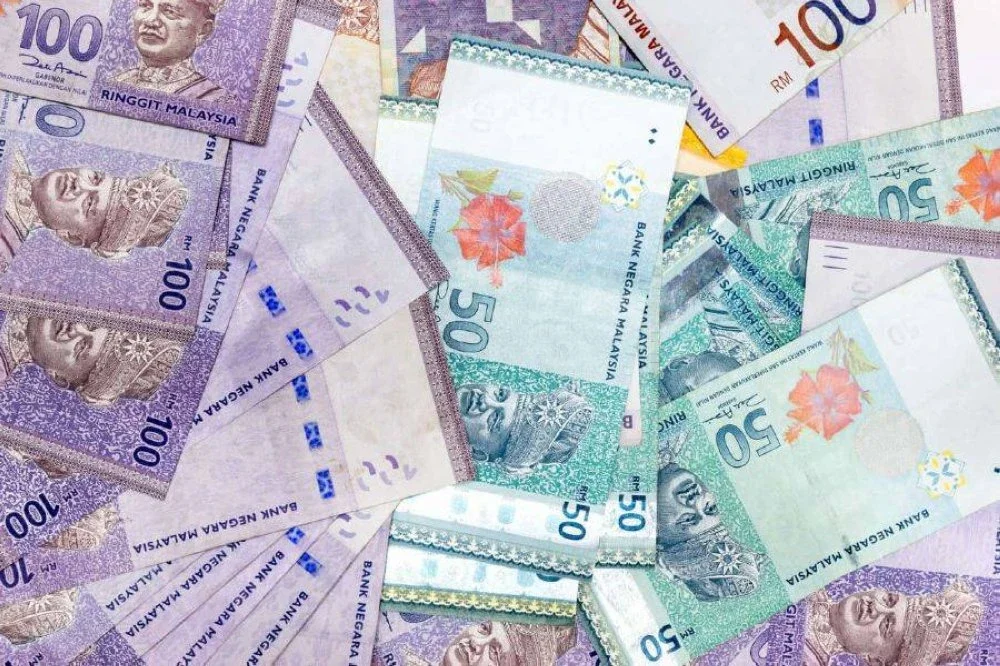 Ringgit ditutup lebih kukuh berbanding dolar AS dan meningkat berbanding kebanyakan mata wang negara di Asia.