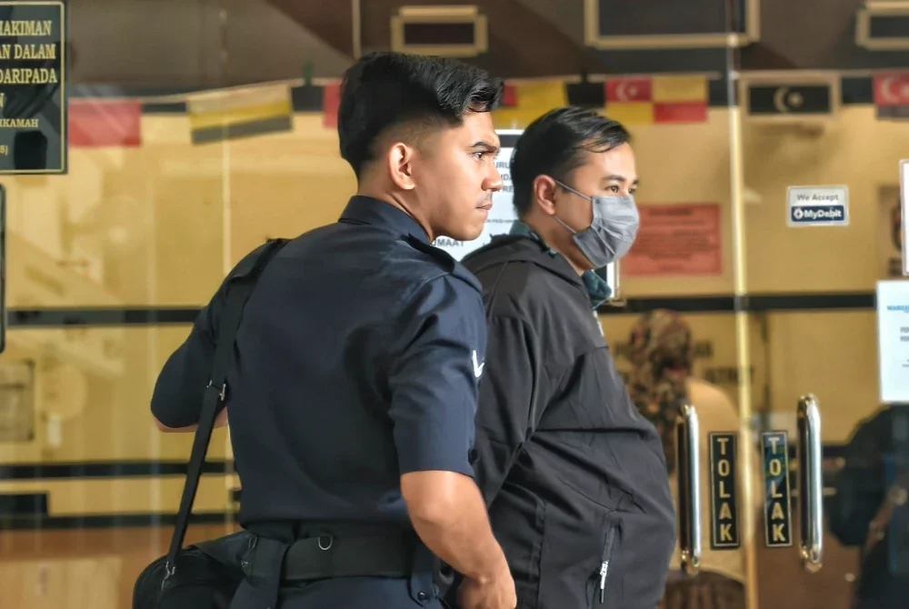 Nazrulhisham dibawa polis ke Mahkamah Sesyen di sini pada Jumaat.