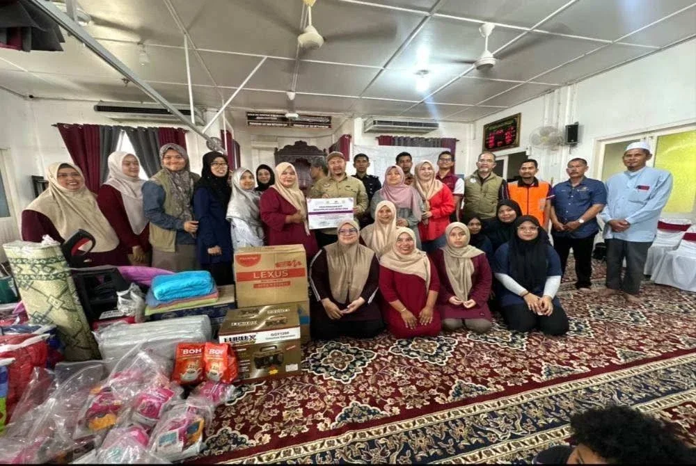 Ahli Jawatakuasa yang mengadakan Program Kesiapsiagaan Bencana di Rantau Panjang, Pasir Mas. 
FOTO SINAR HARIAN - ADILA SHARINNI WAHID