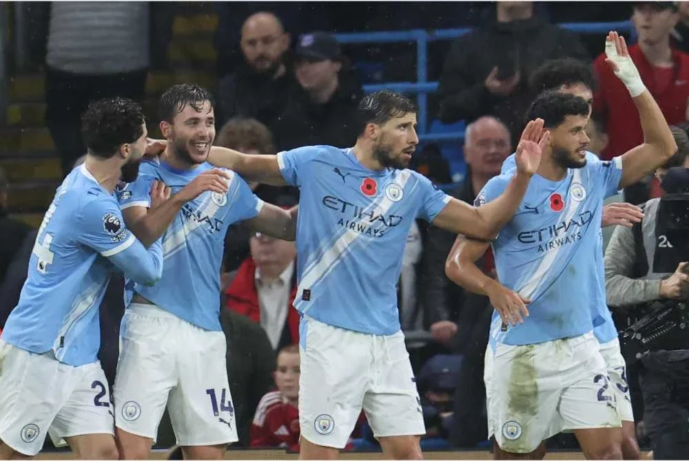 City tampil dengan persembahan terbaik untuk menundukkan Liverpool 3-0. Foto: AFP