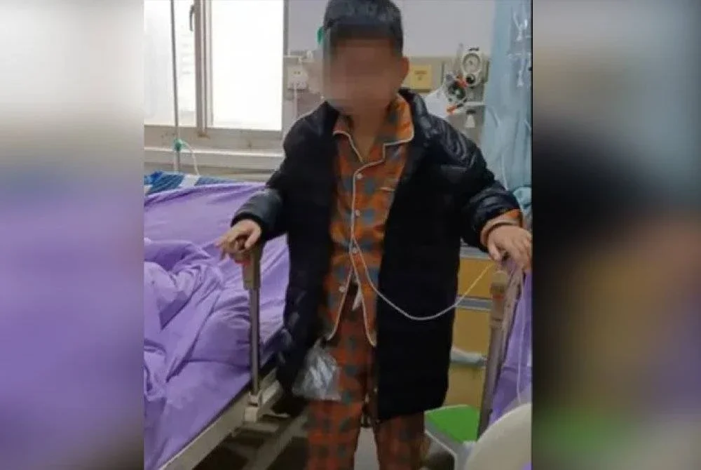 Xiaoye terpaksa hidup bergantung kepada tiub intravena selepas keseluruhan sistem pencernaannya hampir dibuang. Foto Agensi