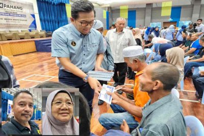 Mohd Shahar menyampaikan bantuan kepada petani ketika Program IMP Kluster Petani, Penternak dan Nelayan Peringkat Daerah Kuantan di Dewan Datuk Seri Abdul Manan Ismail pada Jumaat. Gambar kecil: Ramdan (kiri) dan Hamidah.